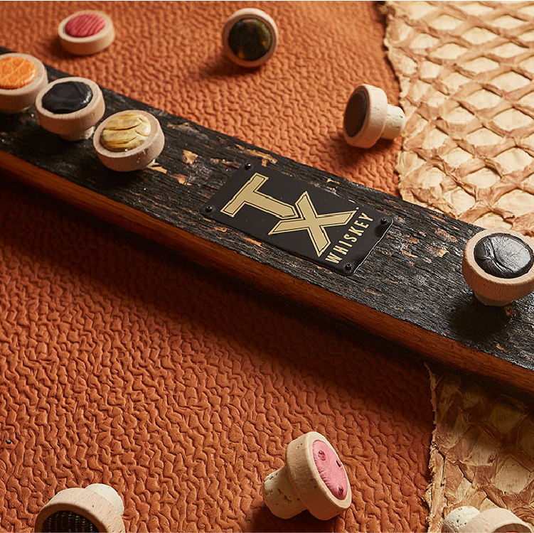 Bottle caps using an assortment of exotic leathers.
